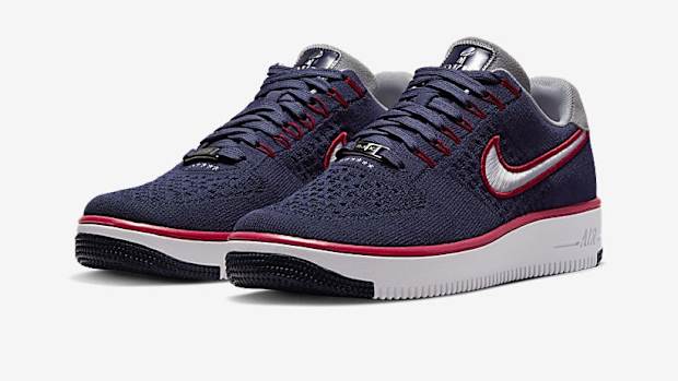 Blue, white, and red Nike Air Force 1 shoes.